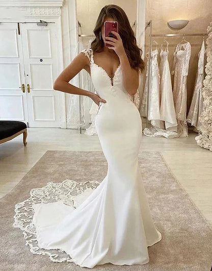 Previous product Next product Satin Mermaid Lace V-neck Cap Sleeves Wedding Dress With Appliques
