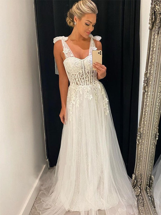 A-Line/Princess Sleeveless Tulle V-neck Ruffles Chapel Train Wedding Dresses